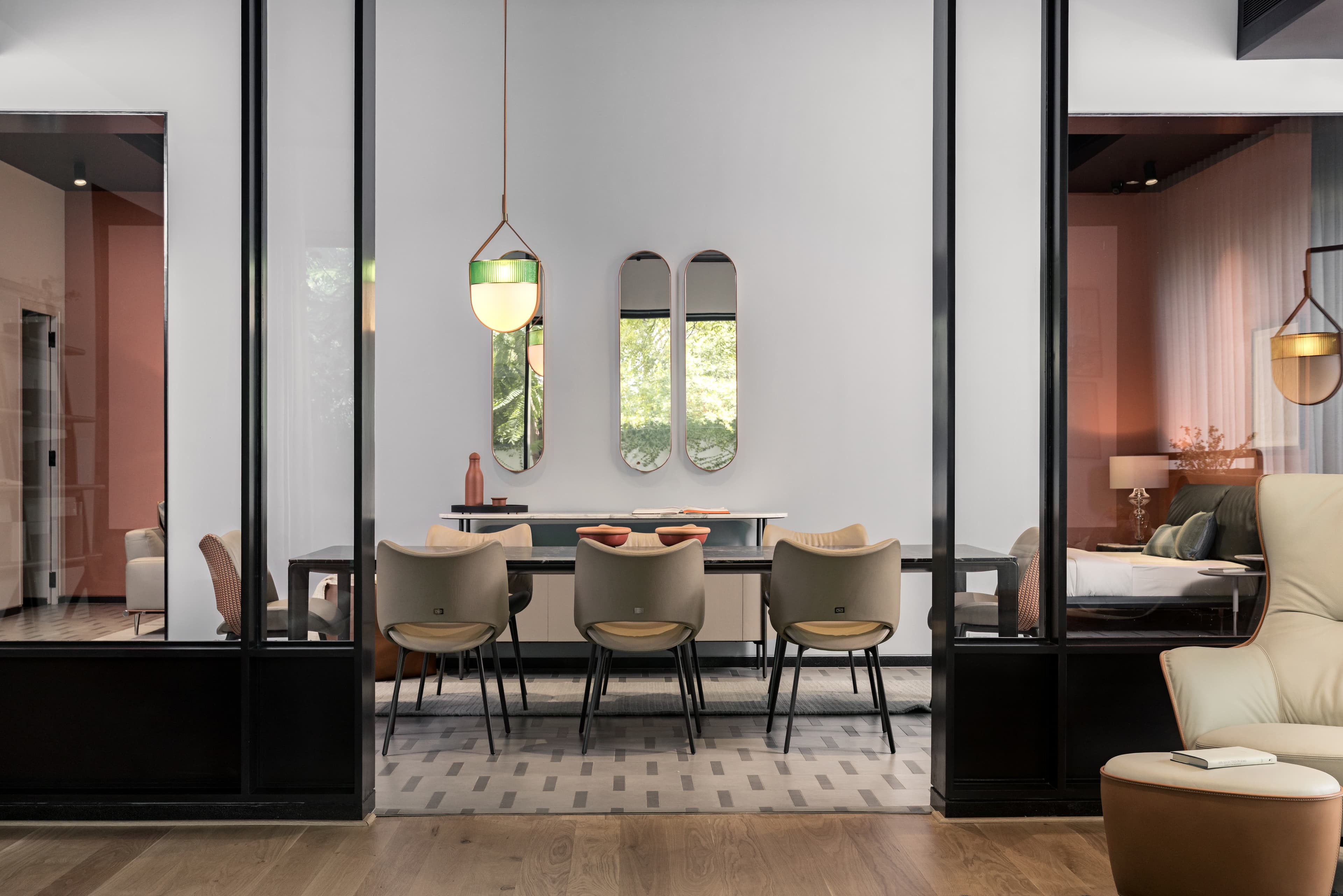 The Artyk gallery — a dining composition framed by glass partitions
