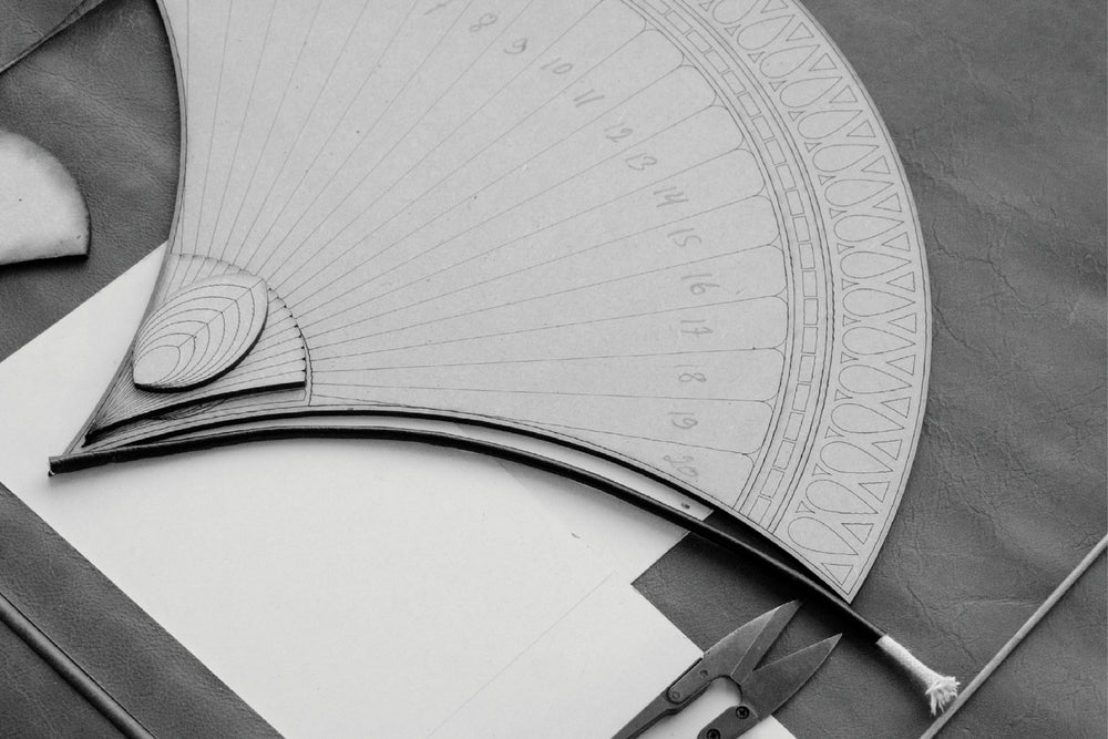 A hand-cut leather pattern template — bespoke craftsmanship in detail